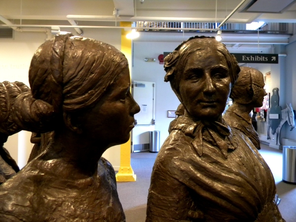 Bronze statues representing the First Wave of women's rights activists (including both women and men) in the lobby of the Visitor's Center. The artist, Lloyd Lillie and two assistants sculpted the statues out of clay, which were then cast in bronze. 